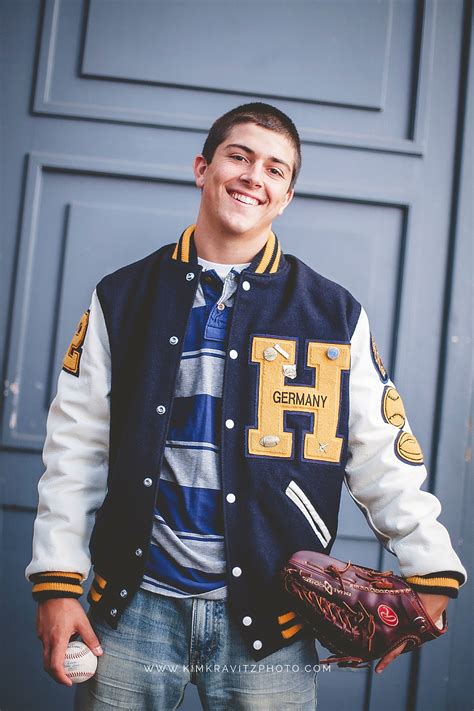 sexy guys wearing varsity jackets .